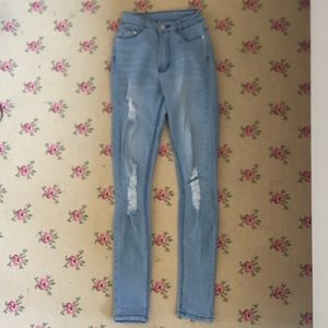 Vintage high rise light wash skinny jeans